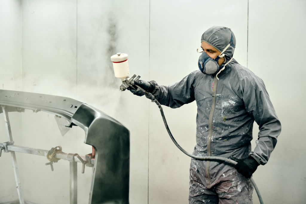 How does cold weather affect spray painting